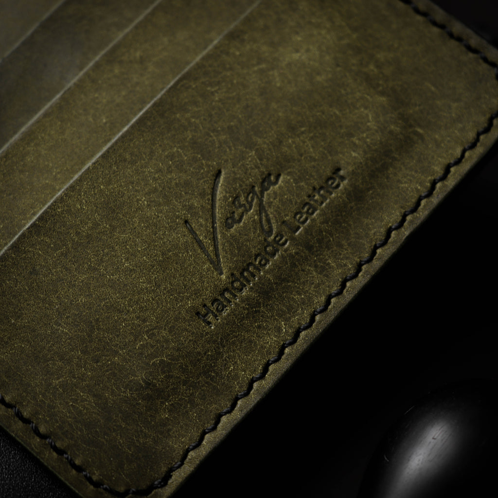 Црно-зелени новчаник