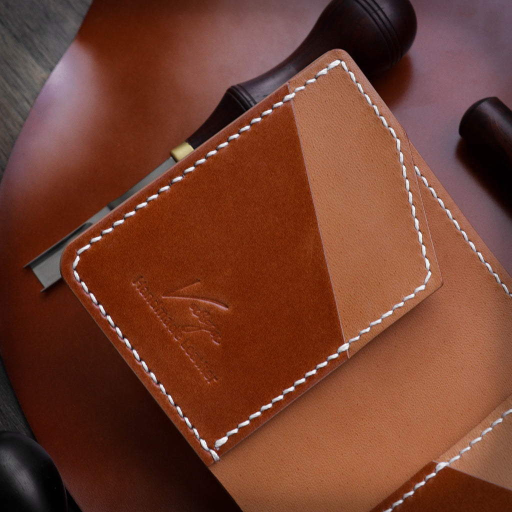 Полушкољкасти кордован новчаник