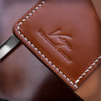 Полушкољкасти кордован новчаник