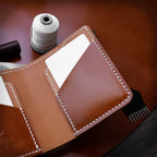 Полушкољкасти кордован новчаник