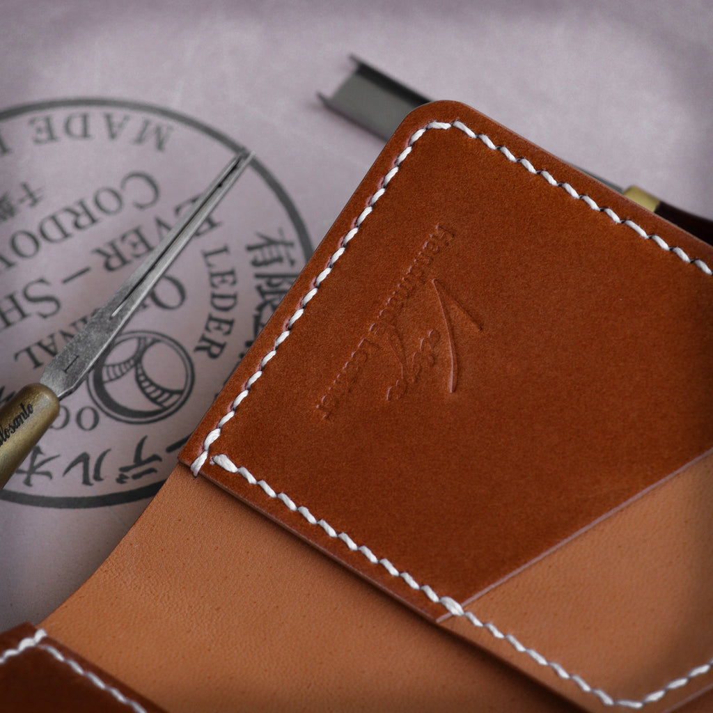 Полушкољкасти кордован новчаник