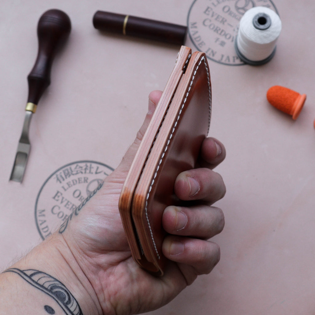 Полушкољкасти кордован новчаник