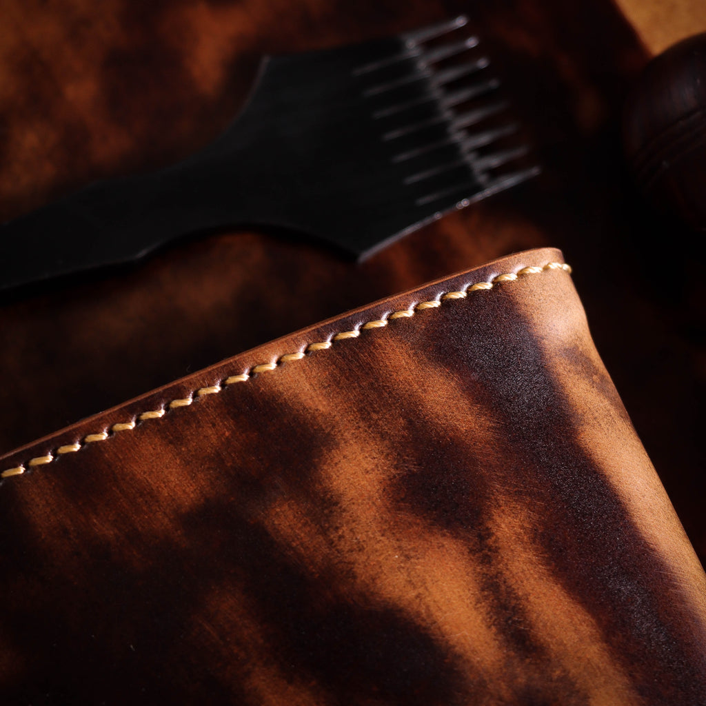 Полушкољкасти кордован новчаник