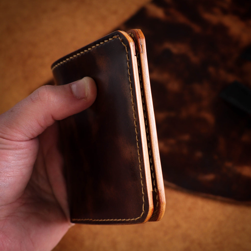 Полушкољкасти кордован новчаник