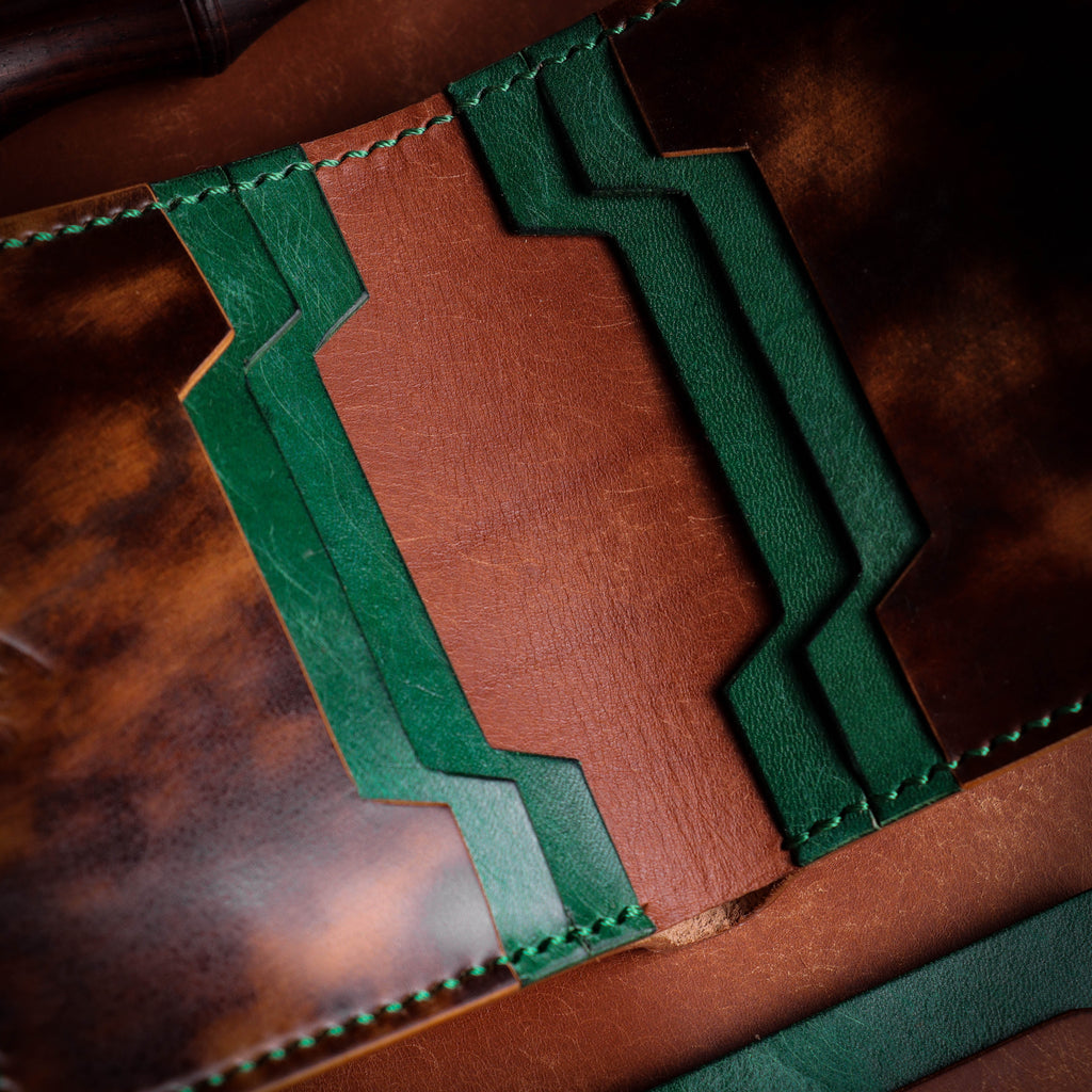 Полушкољкасти кордован новчаник