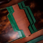 Полушкољкасти кордован новчаник