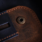 Велика тамноплава и браон кеса за дуван