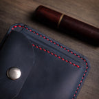 Тегет плави новчаник D1